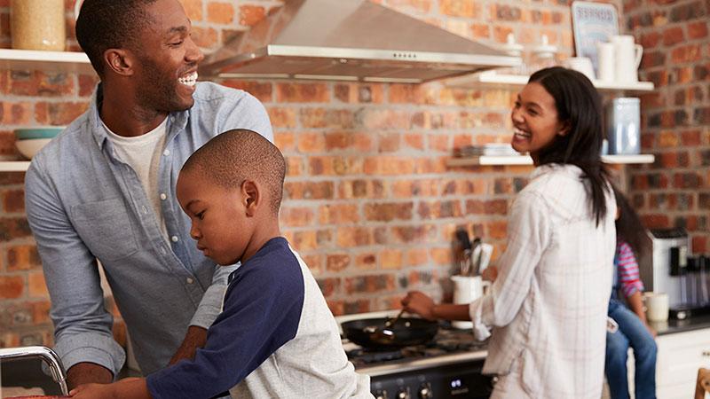 happy African-American family cooking
